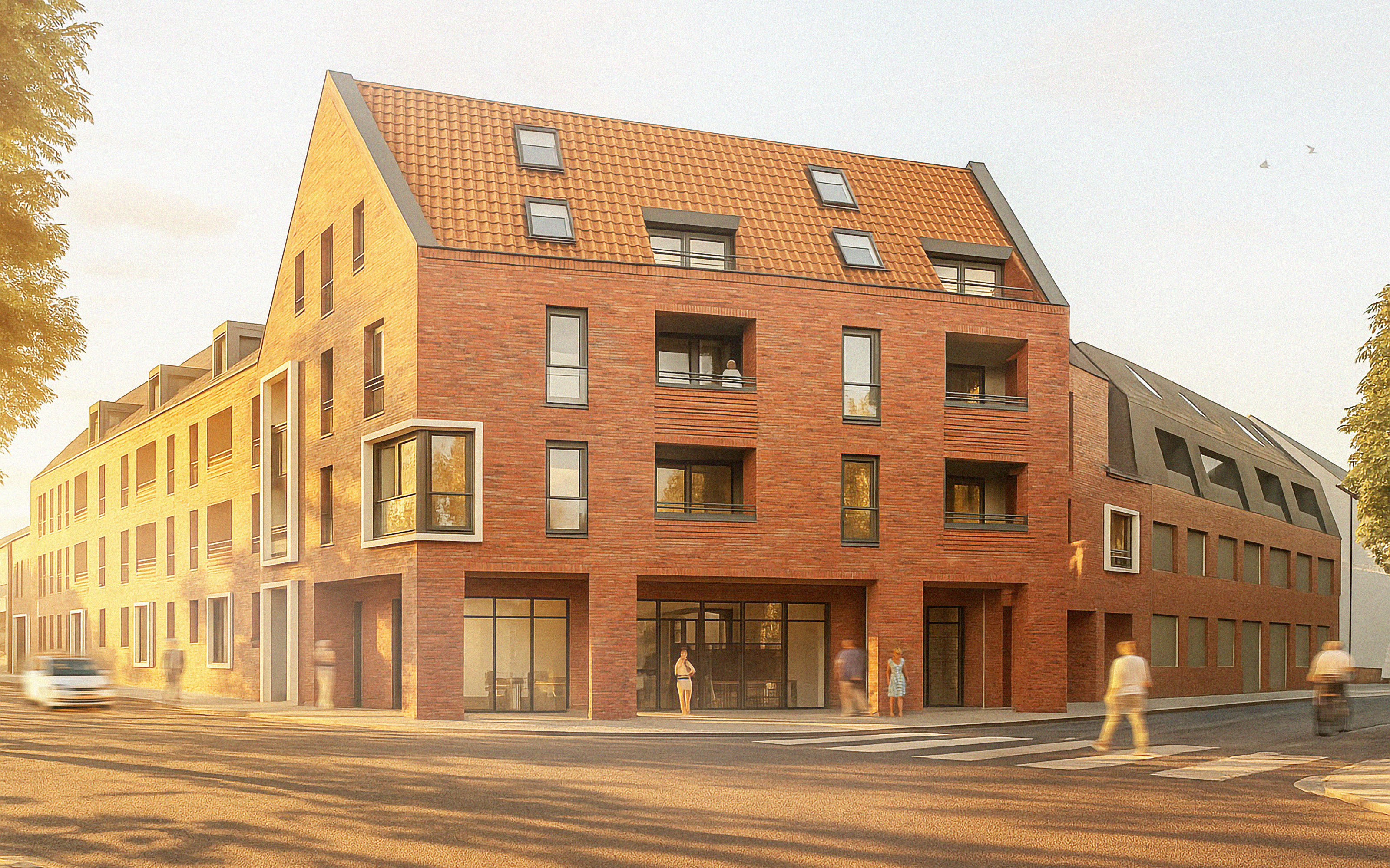 Mehrgeschossiges Wohngebäude mit Klinkerfassade bei Sonnenaufgang.